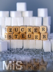 14.10.2026, Thema Zuckersteuer für Softgetränke. Studioaufnahme mit Würfelzucker und Schriftzug ZUCKERSTEUER.  Die Bundesregierung hat sich im Streit um die Zuckersteuer für Getränke geeinigt, Der Kompromiss sieht eine zweistufige Steuer und Ausnahmen für kleinere Hersteller vor. So soll ab dem 1. Juli 2027 ein Steuersatz von 26 Cent auf gesüßte Getränke mit einem Zuckergehalt ab 5 Gramm pro 100 Milliliter erhoben werden. Bei einem Zuckergehalt von 8 Gramm pro 100 Milliliter soll der Satz 32 Cent betragen.
