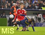 21.10.2026, Fussball UEFA Championsleague 2026/2027: 3.Spieltag,  FC Bayern München - FC Arsenal, in der Allianz-Arena München, v.l. Konrad Laimer (FC Bayern München) gegen Eberechi Eze (FC Arsenal) 
  

